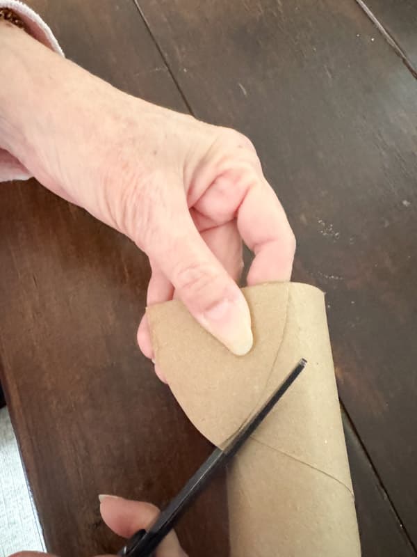 cutting the toilet paper roll to make chunky lambs ears