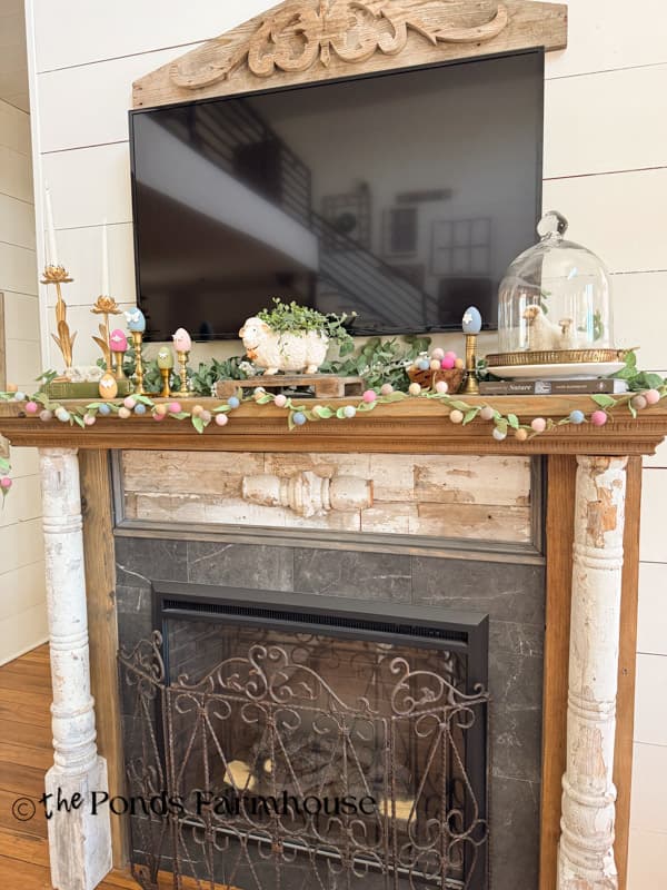 shabby chic Spring & Easter Mantel with felt flower garland, bug motif eggs and lambs