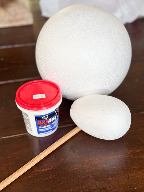 styrofoam ball, egg, spackling and dowel rod