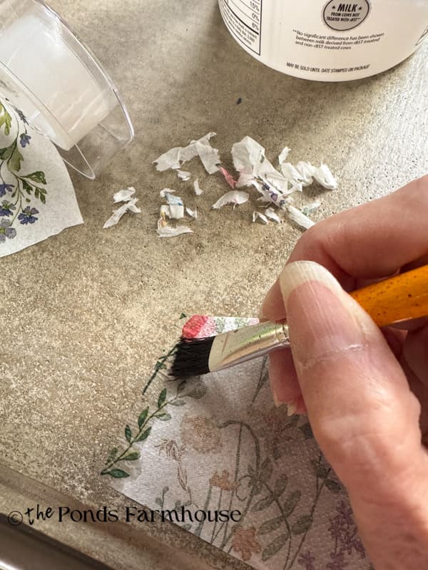 wet napkin with damp paint brush