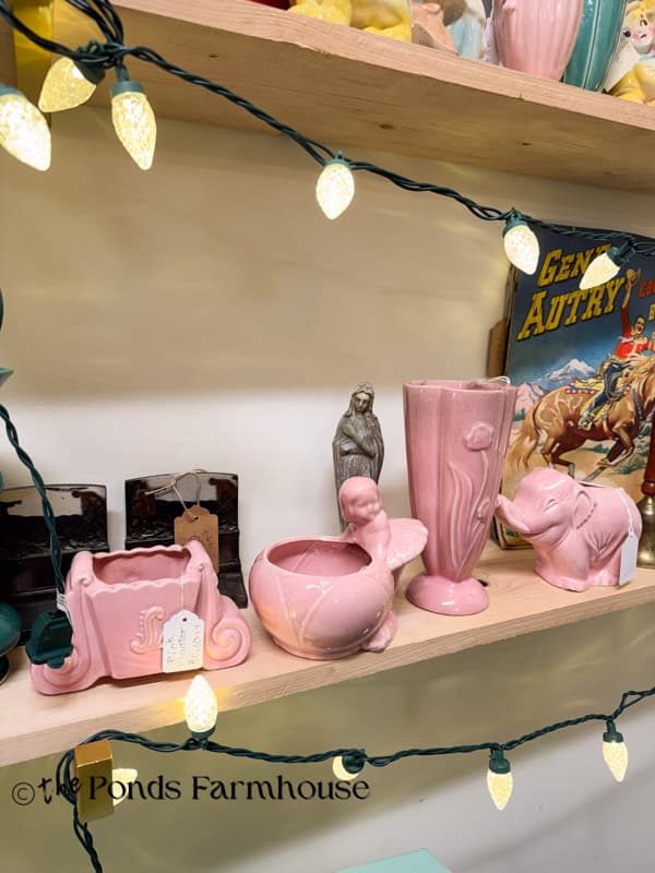 cute pink vintage vases in thrift store