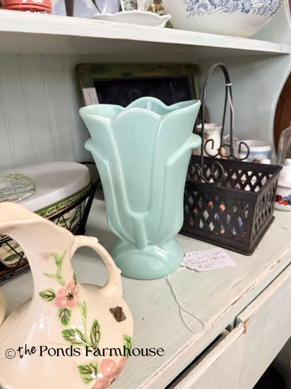 cute vintage blue vase in thrift store