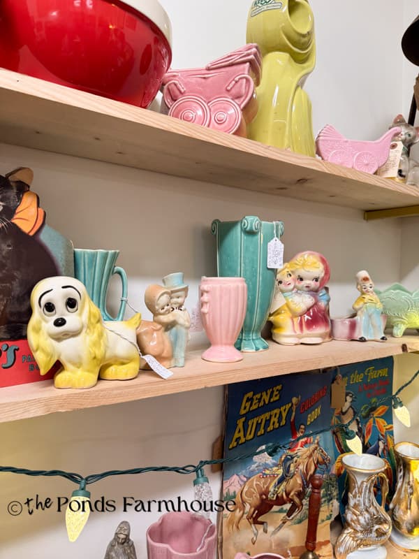 Shelves full of fun vintage vases at the thrift store