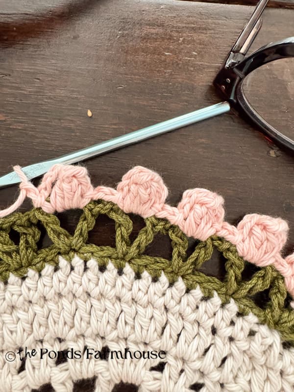 popconr stitch around edge of the Vintage Inspired Round Crochet Placemat