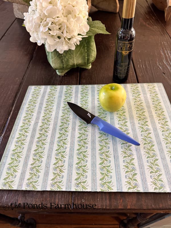 decorative DIY reverse napkin decoupage glass cutting board on kitchen island