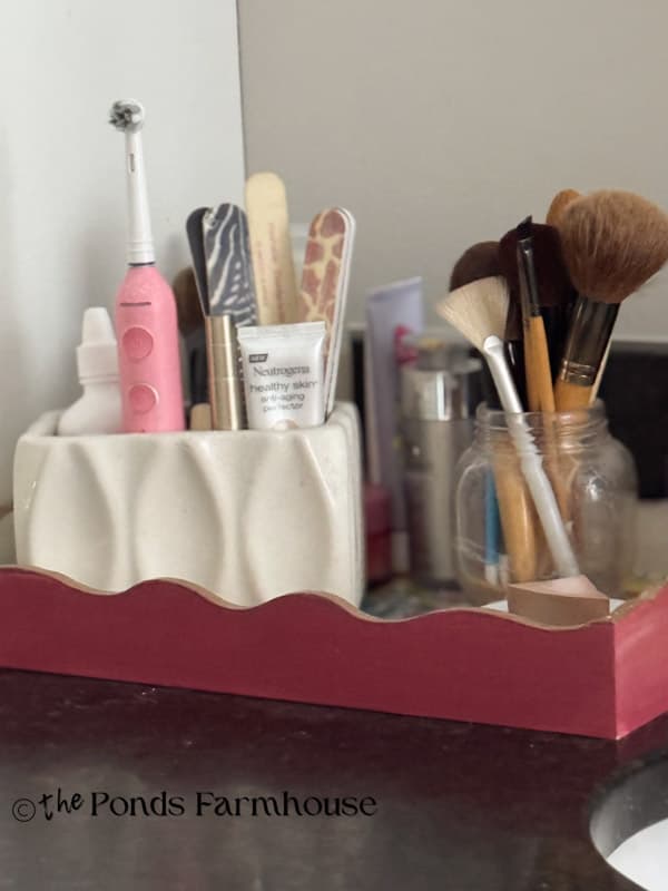 Vintage Thrifted Planter holds makeup and bathroom supplies