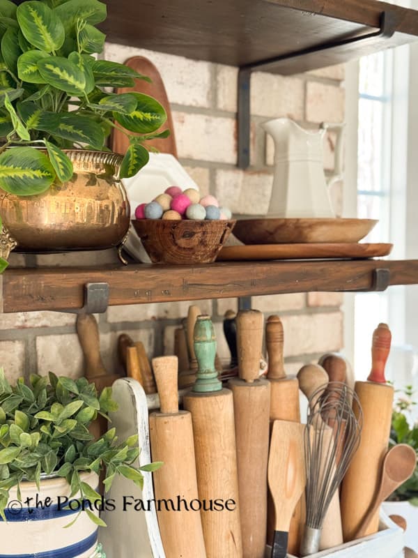 Open Kitchen shelving with vintage rolliing pins and wooden bowls