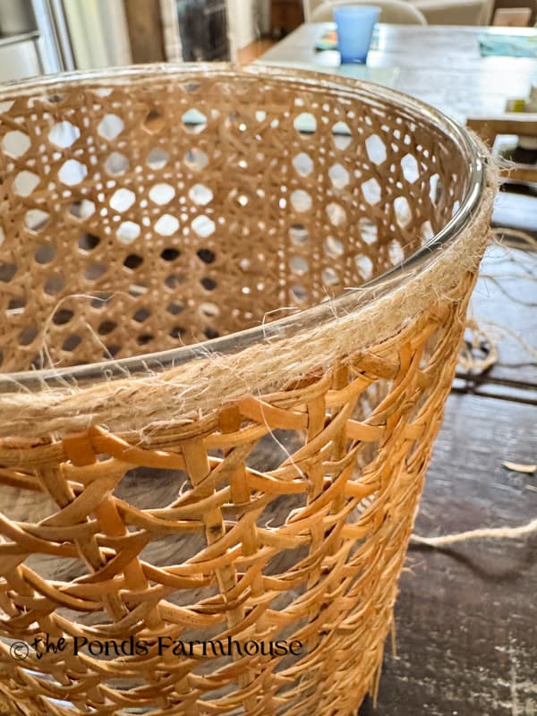 Jute twine wrapped several times around the top and bottom of the vases