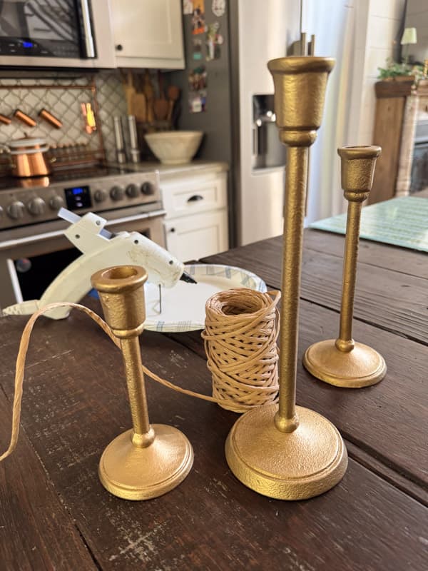 Amazon Brass Candlestick Holders & wired raffia with hot glue gun- supplies to make Serena & Lily Candlestick holder dupe
