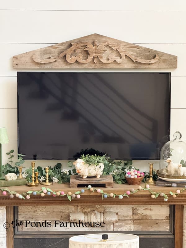 Antique Pediment used over TV in living room