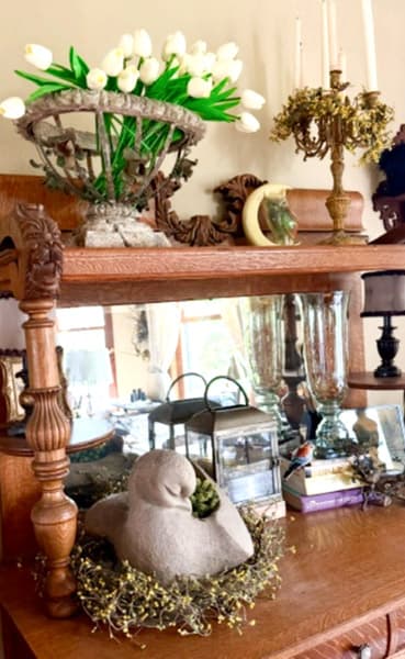 Leah's Antique cabinet and concrete swan