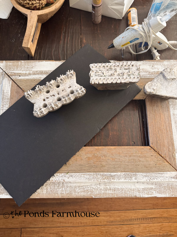 Supplies for framing vintage wallpaper stamps in old barn wood frame