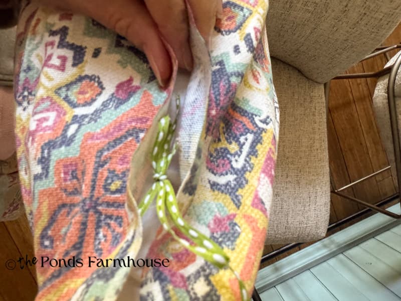 Use ribbon to tie the pillow cover together