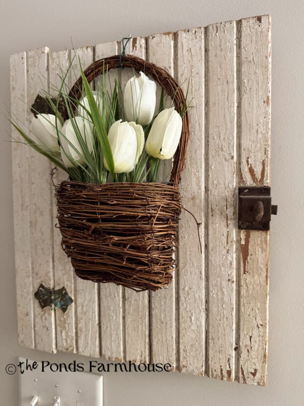 Vintage Cabinet Door used to display seasonal decor and art