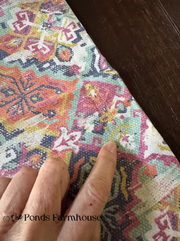 Top stitch 2 inches from the edge of the fabric to make a flange pillow cover