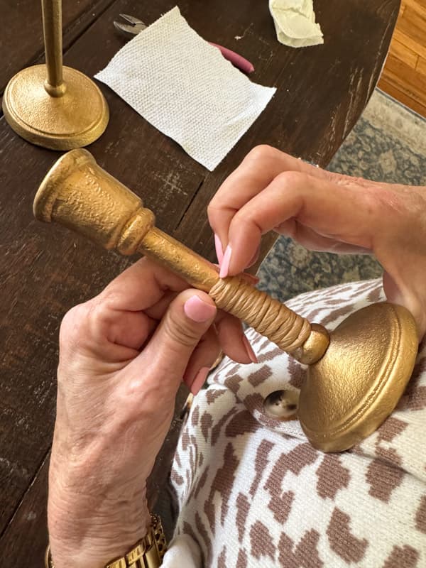 wrap vine wire tightly around the candlestick holder