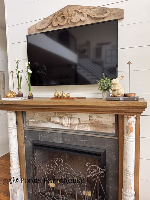 Minimalist summer mantel with vintage bunny, paperwhites and gold figs