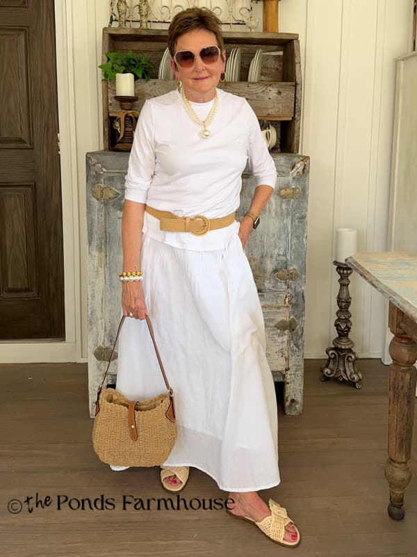 Rachel wearing a white on white outfit