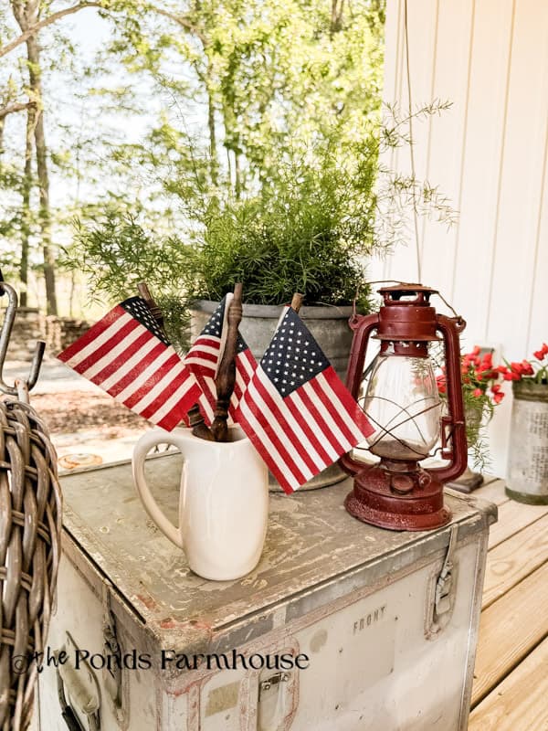 Spindle Flags in Ironstone Pitcher with Red Lantern and fern