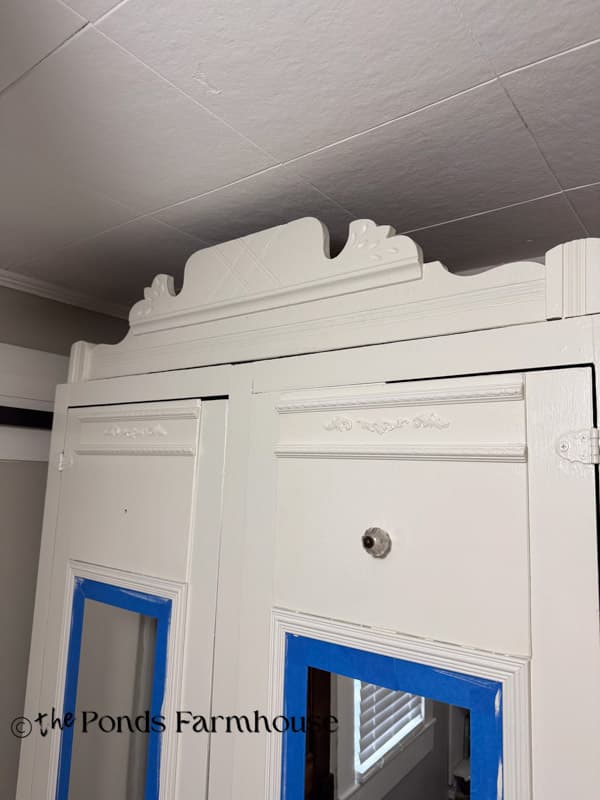 Add pediment to the top of the old wardrobe
