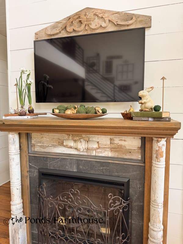 moderately decorated mantel for summer