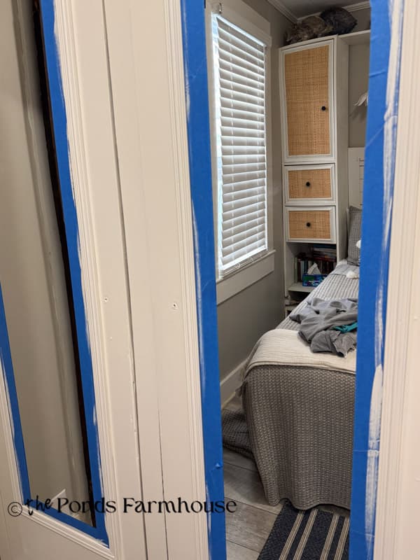 Tape mirrors in order to paint the wardrobe