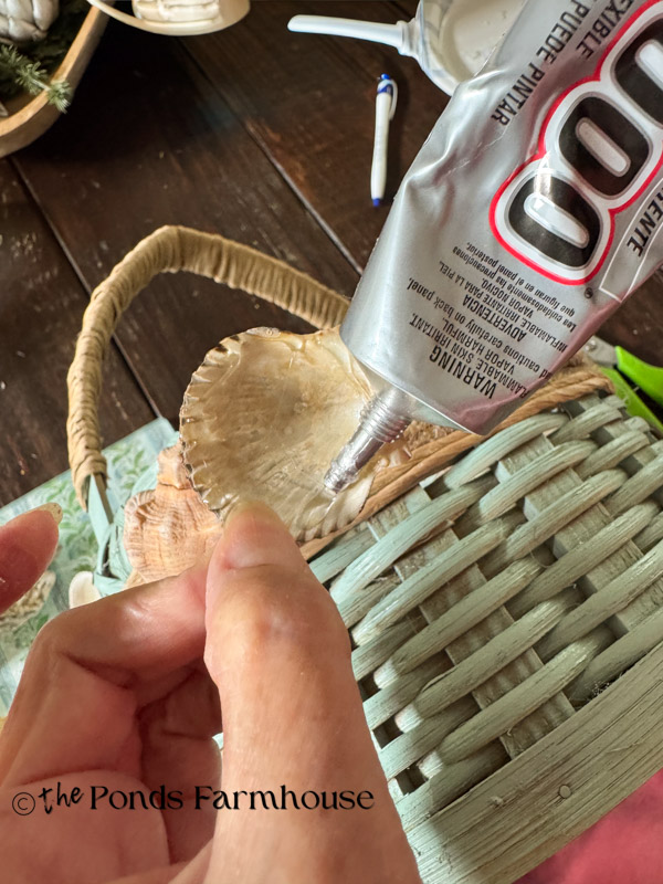 apply E6000 glue to securely attach the shells to the basket