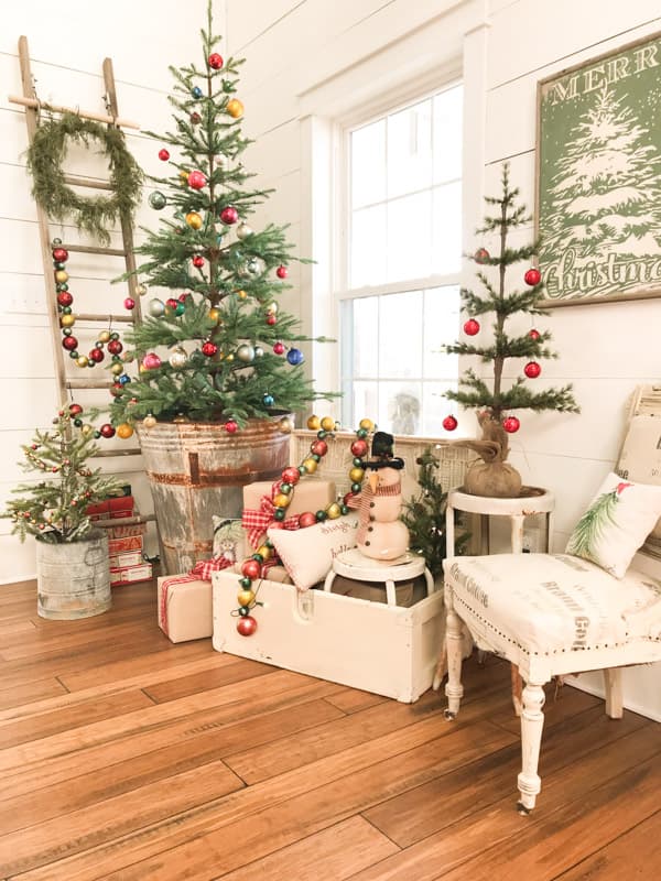 Christmas Tree 2018 with wood Chest filled with vintage decorations.  