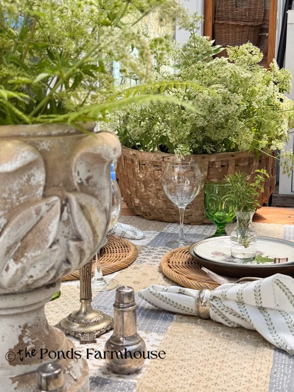 Queen Ann's Lace filled vintage basekt at the end of the Summer garden Party table