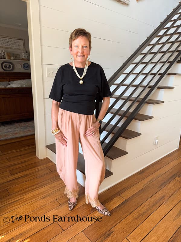 Rachel with lace hem pants & black top