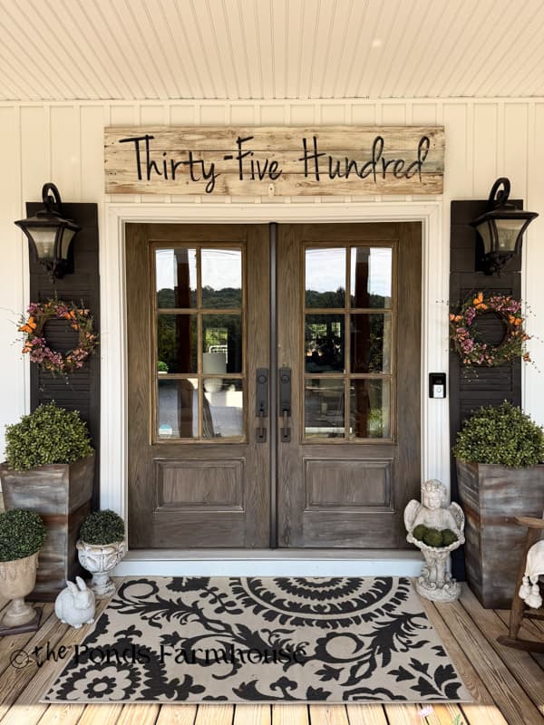 Summer Front Porch with No wilt faux greenery and DIY butterfly Wreaths