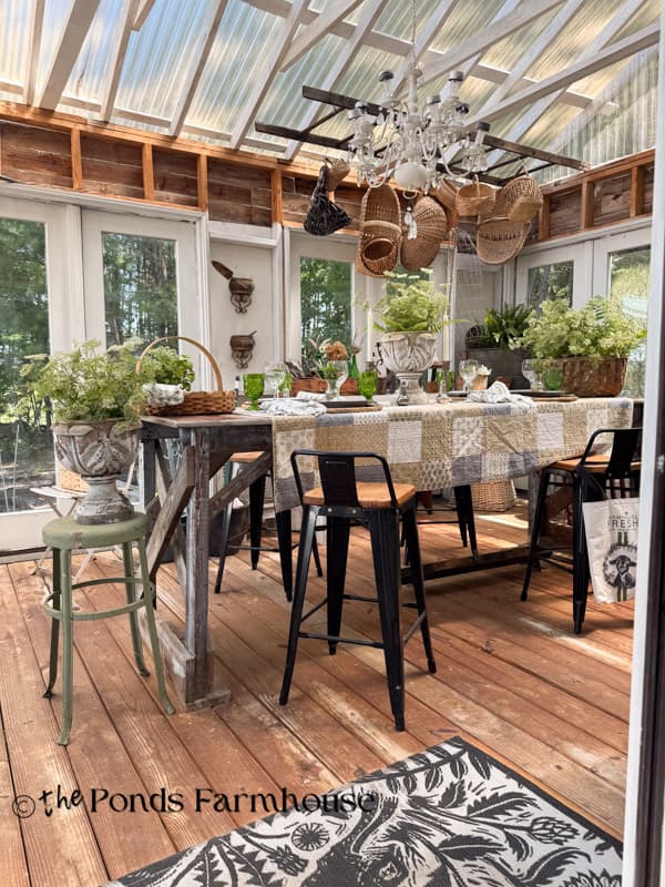 Summer Garden Party table in greenhouse with wildflowers