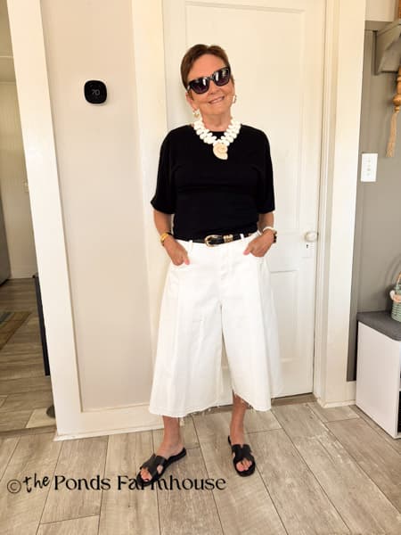 Rachel with culottes and black tee shirt