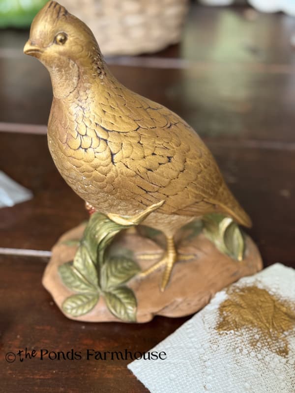 Adding gold leaf rub n buff to the thrifted pheasant figurine