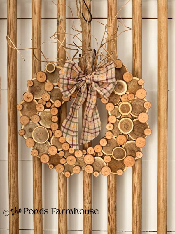 DIY wood Slice Pumpkin wreath on barn door
