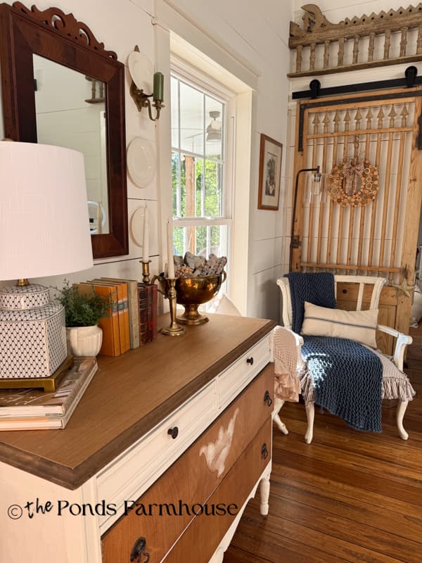 Entry Table and barn door with barn door and DIY Sliced Wood Pumpkin wreath for early fall decorating