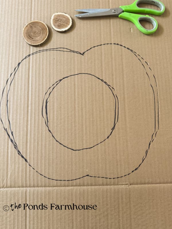 Draw a pumpkin on recycled cardboard box