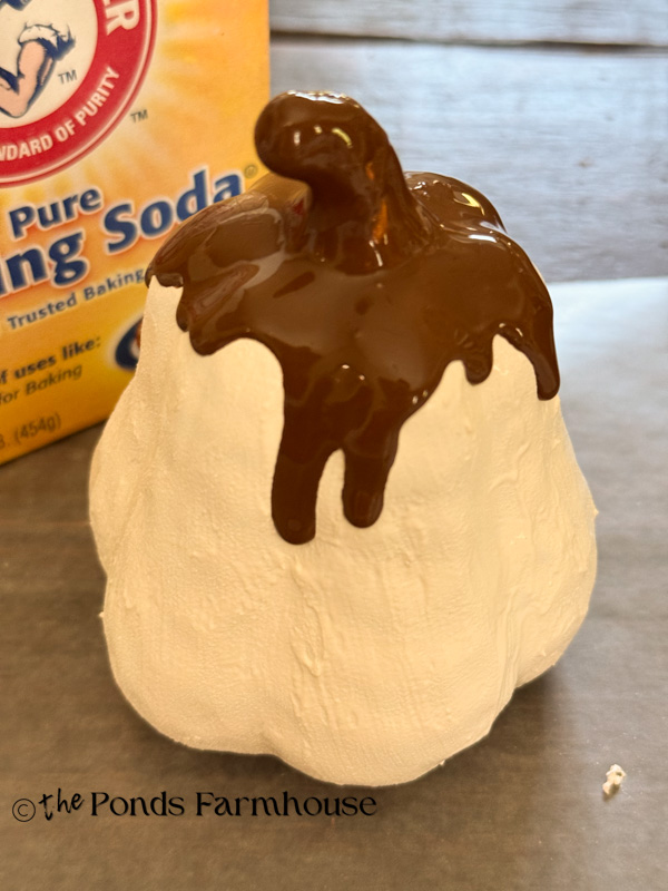 Add chocolate brown glaze to drip down sides of the Dollar Tree Pumpkins
