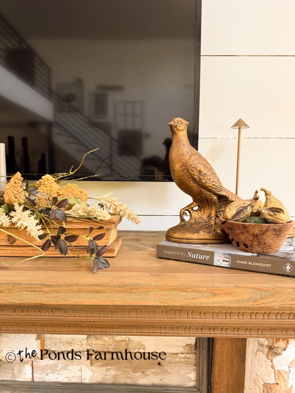 Cozy Fall Mantel with pheasant and gold accents with dried stems