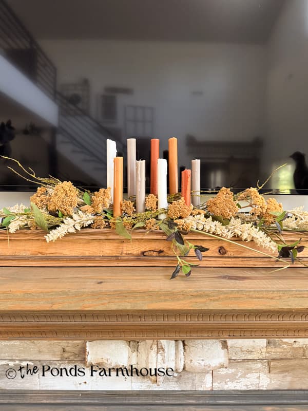 DIY wooden candleholder with layers of dried & faux stems
