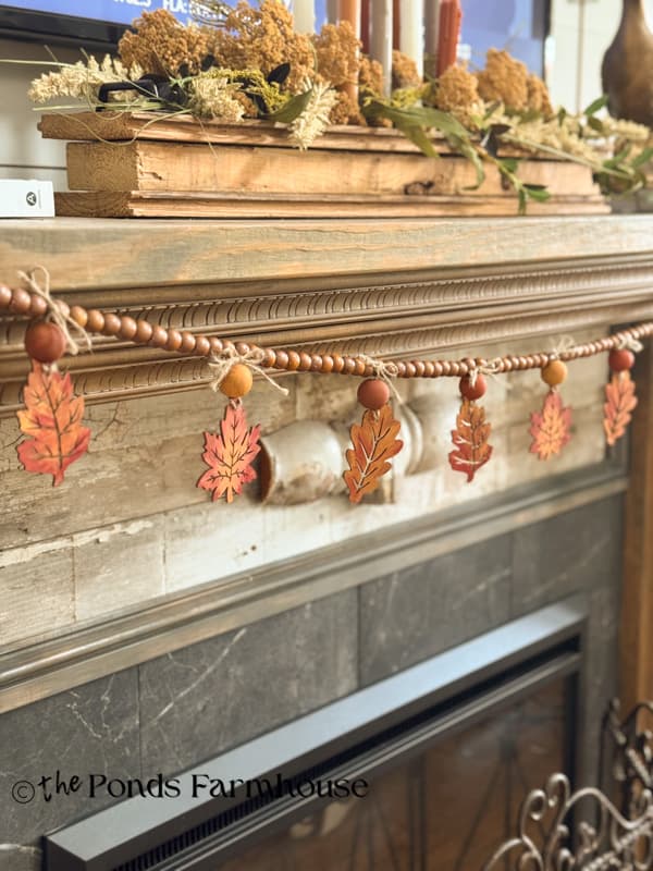 DIY Wooden Leaf & bead garland on DIY shabby chic mantel