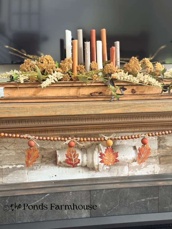 DIY Leaf Garland with DIY wooden candle centerpiece for Autumn Mantel