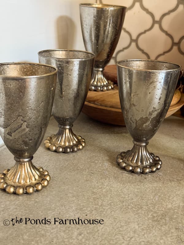 upcycled discolored glassware with DIY Mercury Glass Finish