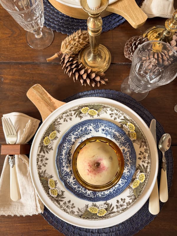 apple added to amber compot dish for place setting