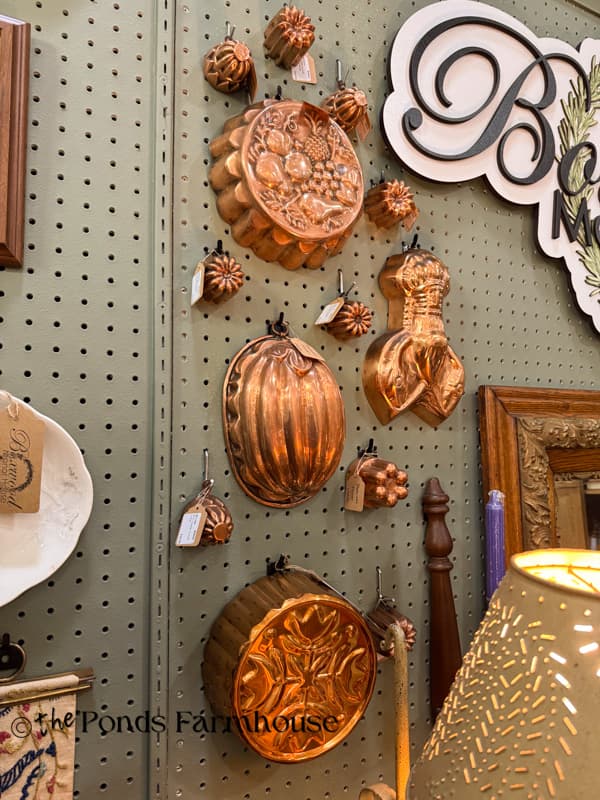 copper molds in antique booth