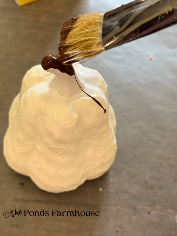 dripping the brown glaze over the top of the pumpkins