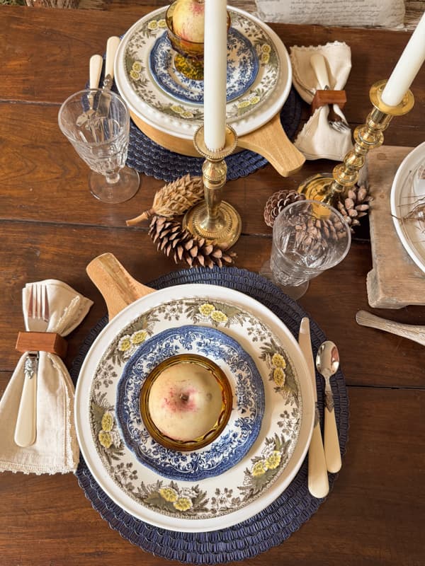 flat lay of table place setting with blue and brown.
