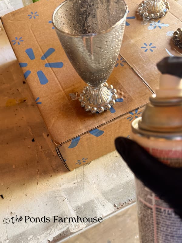 spray paint the base of the glasses on the outside