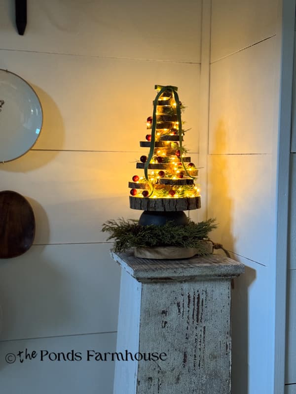 DIY Wood slice tree on post in dining room