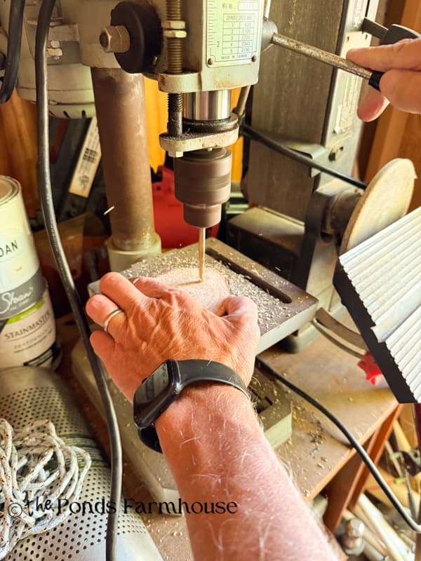 Drilling holes in wood slices